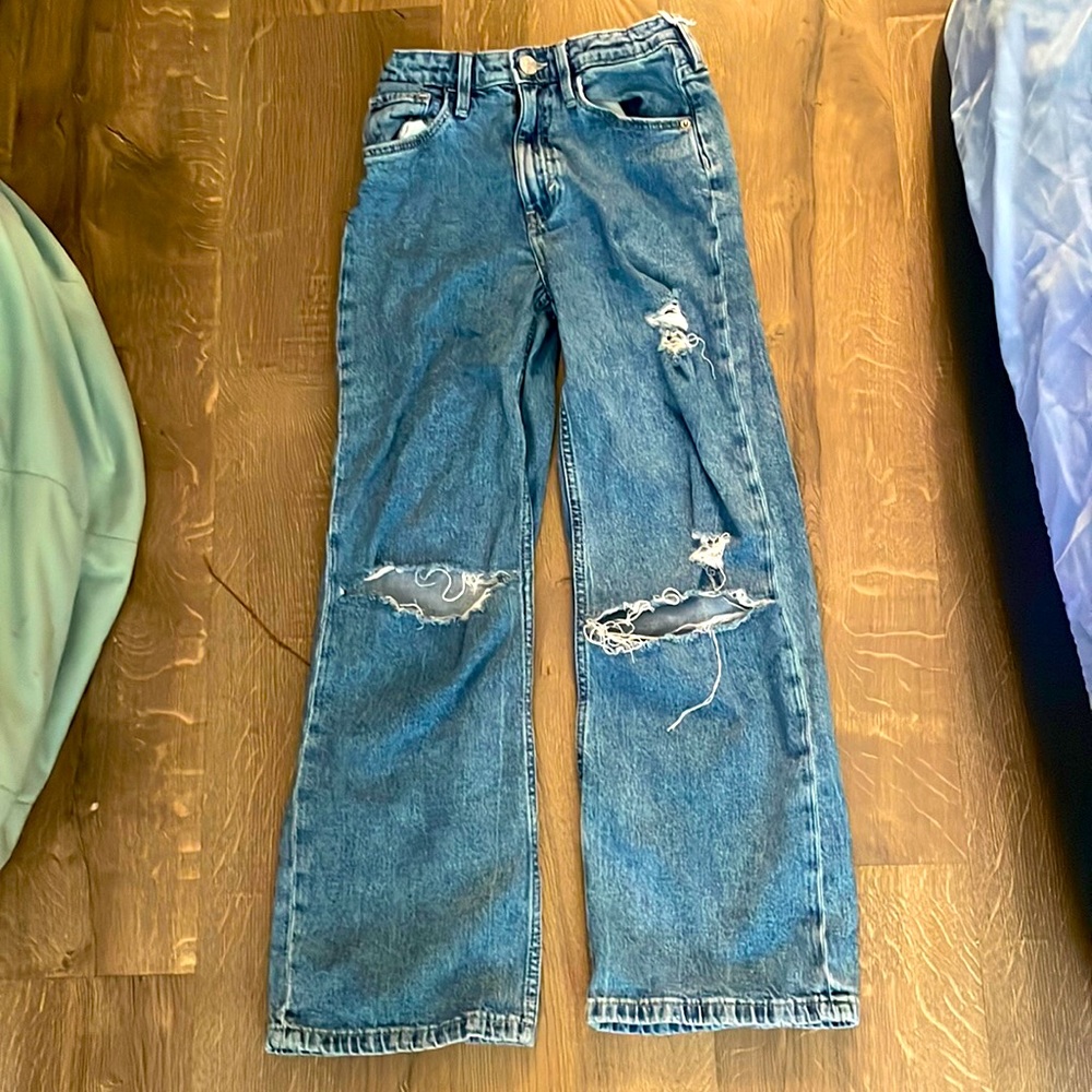 Denim jeans (size and high or low rise info on the photo of the tag)
